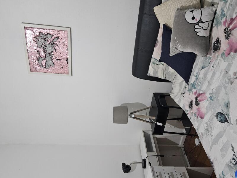 Double bed, white fresh walls. Desk, lamp , bookshelf and double built in wardrobe. 
