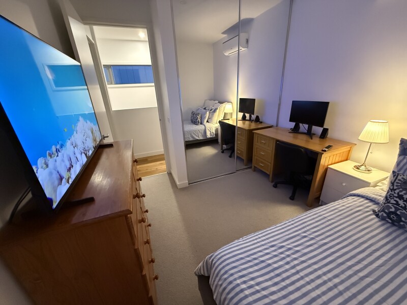Bedroom,desk, tallboy, built-in wardrobes, TV,AC, high-speed Internet. HBO, Prime, Netflix