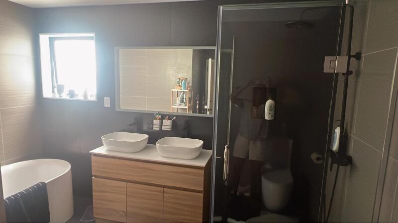 Beautiful new bathroom with large bathtub, double basin, large showerr, toilet, underfloor heating 