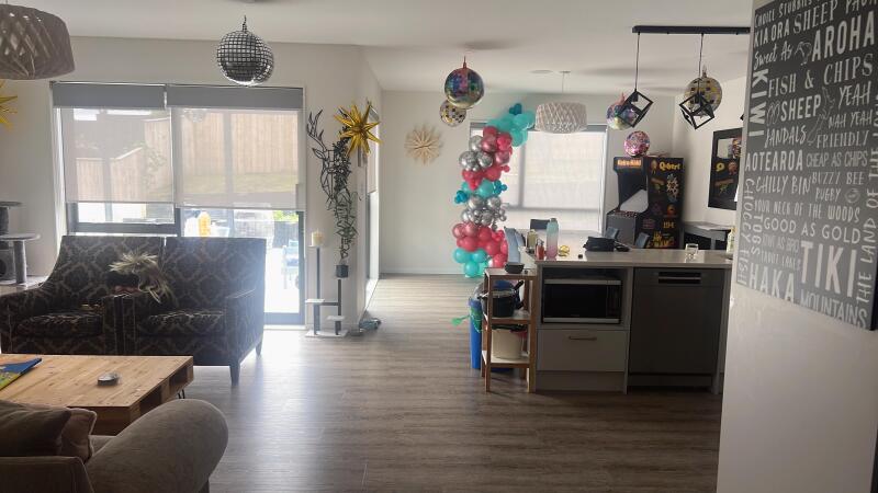 Large spacious living area downstairs with two lounges, dining room, large kitchen and outside covered patio area to entertain your friends