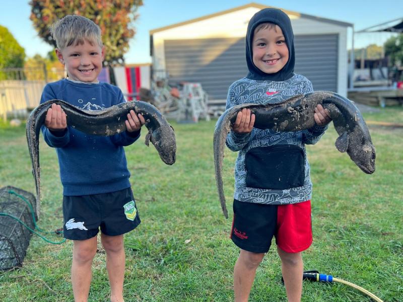 Two young boys eeling at our holiday home.
