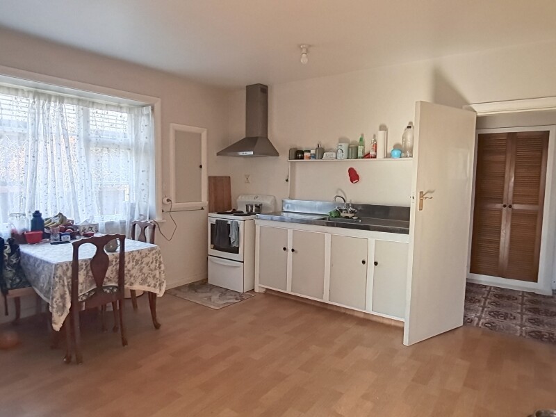 This is the kitchen with a log burner.